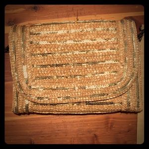 Gold wicker clutch